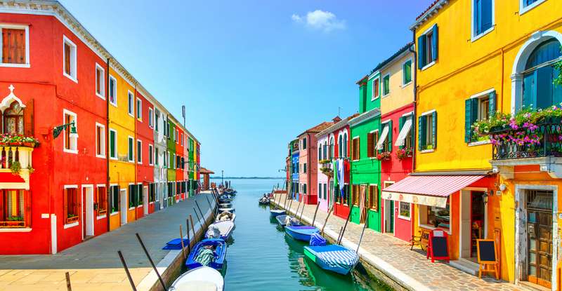 Burano, a lagoon island outside Venice, is known for its colorful fishermen's houses. (License documentation: Shutterstock-StevanZZ)